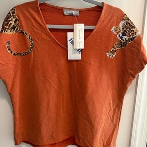 Blueb too w sequin tiger detail on shoulders. Never worn nwt